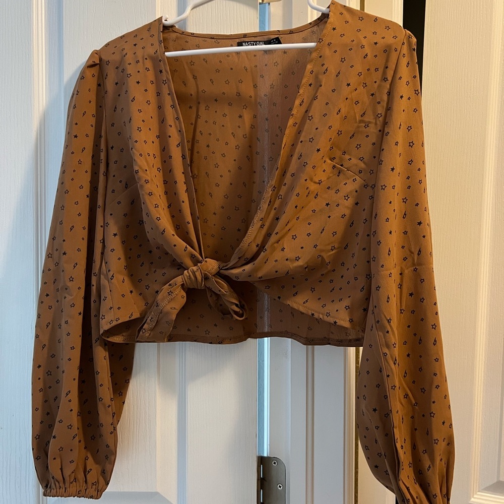 Brown star and lightening v neck blouse